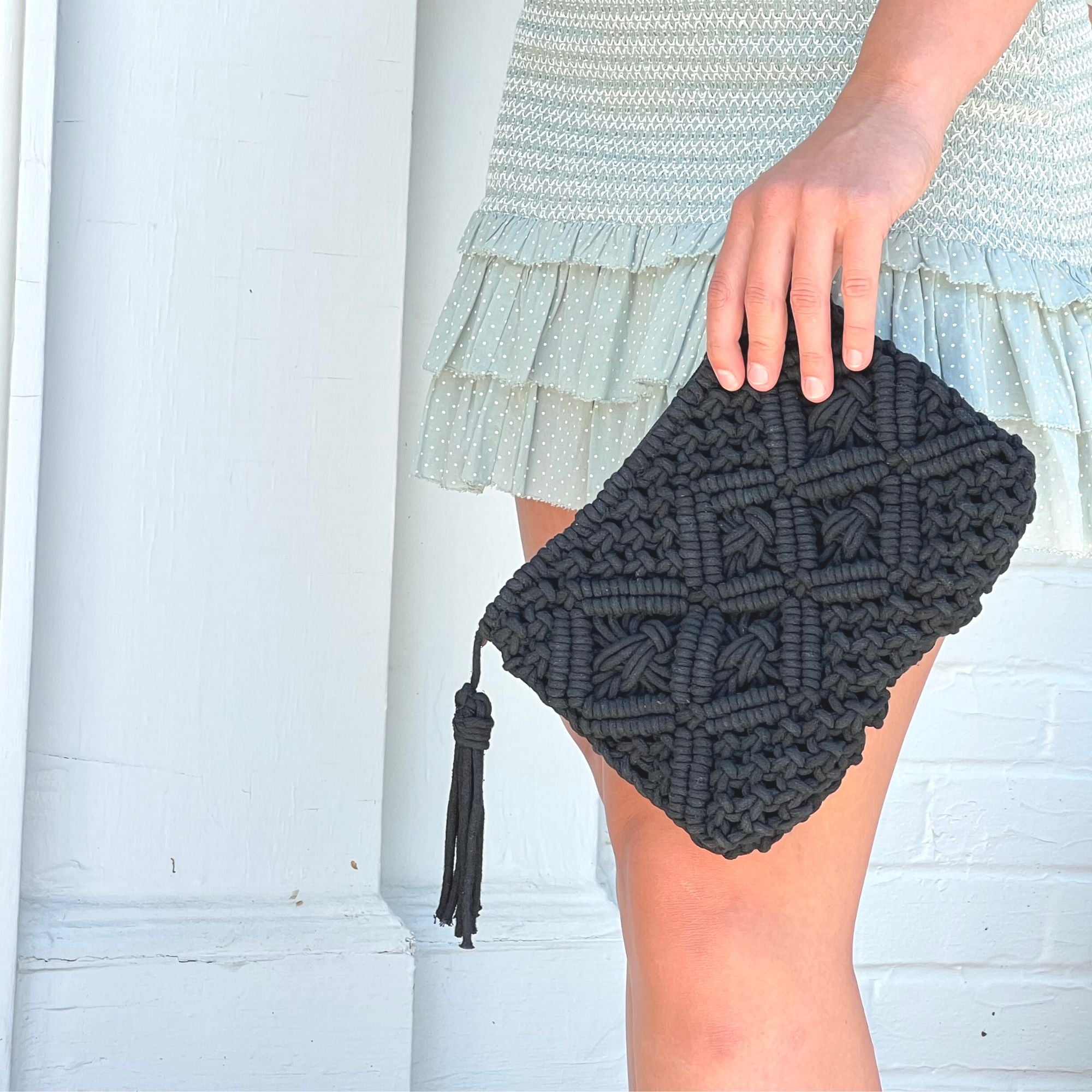 Black macrame clutch crafted in India with recycled cotton